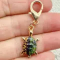 Cute turtle keychain charm with colorful enamel shell and gold lobster clasp variant design. - Dual-Tone Print Turtle / Ivory