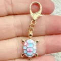 Cute turtle keychain and bag pendant with colorful floral enamel design and lobster clasp. - Slate Gray