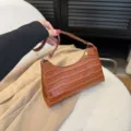 Brown crocodile pattern baguette shoulder bag, stylish PU leather handbag for daily wear. - Brown