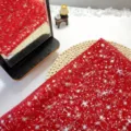 Red star mesh fabric sleeve tulle material featuring shiny silver glitter stars for diy sewing crafts. - 130cm Shoulder to Hem / Red