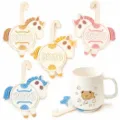 Cute 2026 cartoon horse silicone cup mats with hanging hooks and a matching ceramic mug set. - 15