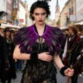 Detailed view of the gothic black and purple feather shawl cape for costume party events. - One Size (Lace-up) / Tops / Purple