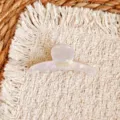 Detail view of a pearlescent white acetate hair claw clip, elegant and chic hair accessory. - 6cm / Mermaid Color