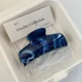 Blue marbled hair claw clip, stylish acetate geometric shark clip for daily elegant hair styling. - Blue