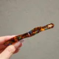 Classic tortoiseshell acetate hair clip, elegant wavy design, versatile hair accessory. - Blue Coffee Wave