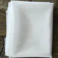 White bridal tulle veil fabric, lightweight mesh material for wedding photography. - One Size / Ivory