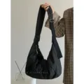 Casual black nylon crossbody dumpling bag for women, large capacity soft shoulder bag. - Black
