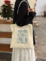 Pearl lace canvas tote bag for women, stylish single shoulder commuter bag for daily use. - Blue