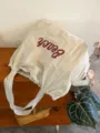 Canvas shoulder tote bag detail view, casual beige style with letter print, large capacity daily use. - Light Gray
