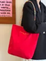 Korean style canvas tote bag with colorful braided straps, large capacity red shoulder bag. - Red
