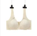 Front closure lace bra detail shot showcasing the delicate floral lace cups and comfortable straps. - M / Tops / Nude