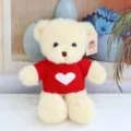 Cute plush teddy bear toy wearing red sweater with white heart pattern, soft and cuddly. - Red Heart Sweater Beige Bear / 30 cm