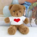 Cute brown plush teddy bear toy wearing a white knitted sweater with red heart for kids. - White Heart Sweater Brown Bear / 30 cm