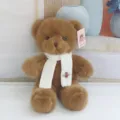Cute brown plush teddy bear toy wearing white knitted scarf and bee brooch, perfect gift. - White Scarf Brown Bear / 30 cm