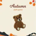 Cute brown bear embroidery cloth patch detail for DIY canvas bag or sweatshirt decoration. - Sitting Bear