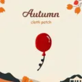 Close up view of a red balloon cloth patch, detailed embroidery texture for DIY autumn style. - Red Balloon