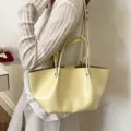 Light yellow faux leather tote bag, large capacity stylish shoulder bag for women daily commute. - Yellow
