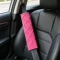 Pink plush car seat belt shoulder pad, soft velvet vehicle safety strap cover detail. - M Pattern Shoulder Pad / M Pattern Pink Pair