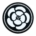 Round silicone car coaster with a stylish white camellia flower pattern and rhinestones. - Large Camellia with Rhinestones Coaster / Black