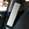 Plush car seatbelt shoulder pad, soft quilted design for comfortable driving experience. - Beige Plaid