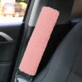 Pink sherpa car seat belt cover, soft plush shoulder pad for a comfortable driving experience. - 25.5x6cm / Pink