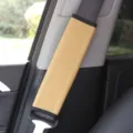 Car seatbelt shoulder pad, soft PU leather quilted protector cover for comfortable driving experience. - Beige
