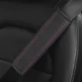 Black leather car seat belt shoulder pad with pink diamond stitching and embossing. - 6.5x23cm / Black with Pink Stitching
