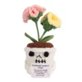 Handmade crochet potted plant featuring a cute skull pot holding a warm card for gifts. - Carnation Pink Yellow