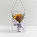 Handcrafted crochet sunflower bouquet in clear gift box for teacher day and gifts. - Smiley Sunflower / Purple and White