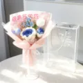 Handmade crochet yarn flower bouquet gift for Mother's Day, blue and white roses. - Thai Roses with PET Box