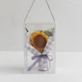 Handmade crochet sunflower bouquet gift in clear display box with purple plaid wrapping paper - Sunflower / Purple And White