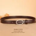 Women's leather belt with stylish oval metal buckle casual thin waist strap for jeans dress - Coffee / 100cm