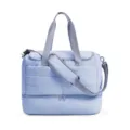 Leichte gesteppte Reisetasche mit unterem Reißverschlussfach und verstellbarem Schultergurt. - Blau
