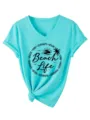 Women casual V-neck short sleeve turquoise t-shirt with beach life graphic and knot hem. - S / Deep Water Blue
