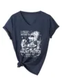 Gedetailleerd overzicht van het dames V-hals t-shirt met skeletprint en geknoopte zoom. - S / Marineblauw