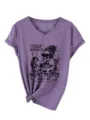 Stijlvol dames V-hals t-shirt met korte mouwen, grappige skeleton print en knoopdetail. - S / Paars