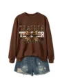 Sudadera marrón de manga larga para mujer con gráfico de leopardo y shorts vaqueros. - S / Café