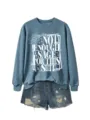 Casual blue long sleeve sweatshirt featuring graphic print paired with distressed denim shorts. - Blue (White Font)