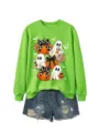 Detaillierte Ansicht des leuchtend grünen Halloween Sweatshirts mit niedlichen Geister Motiven. - Neongrünes Sweatshirt (Weißes Muster)