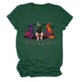 Detailed close-up view of the witch hats graphic print on the dark green casual t-shirt. - S / Tops / Vintage Green
