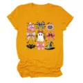 Modieus geel dames t-shirt met korte mouwen en roze strik geest Halloween grafisch ontwerp. - S / Tops / Mosterdgeel
