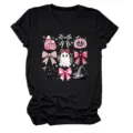 Stylish women's black short sleeve t-shirt featuring pink Halloween ghost and bow graphic. - S / Tops / Black