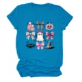 Close-up detail of the pink Halloween bow and ghost graphic on the blue short-sleeve t-shirt. - S / Tops / Lake Blue