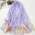 Detailed view of the light purple chiffon scarf featuring elegant gradient floral print. - New Year Flower Light Purple
