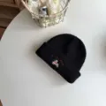 Cute black knitted beanie hat for kids with adorable puppy embroidery and warm winter style. - Hat / Black
