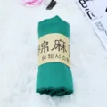 Sciarpa tinta unita verde in cotone lino arrotolata, scialle mare protezione solare. - N. 8 Verde