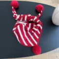 Red white striped kids knitted scarf with pom-pom details, warm winter children winter bib view. - Geometric Blue / Striped Pom-Pom Triangle Scarf - Red
