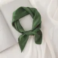 Dark green solid silk square scarf detail shot, elegant fabric texture for stylish neckerchief. - Dark Green