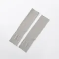 Detailed view of grey cooling arm sleeves with seamless knit pattern, ideal for sports. - Fingerless (Unscented) / Gray