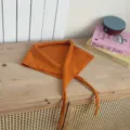 Knitted triangular scarf for women, solid color tie neck warmer, cozy autumn shawl detail. - Orange